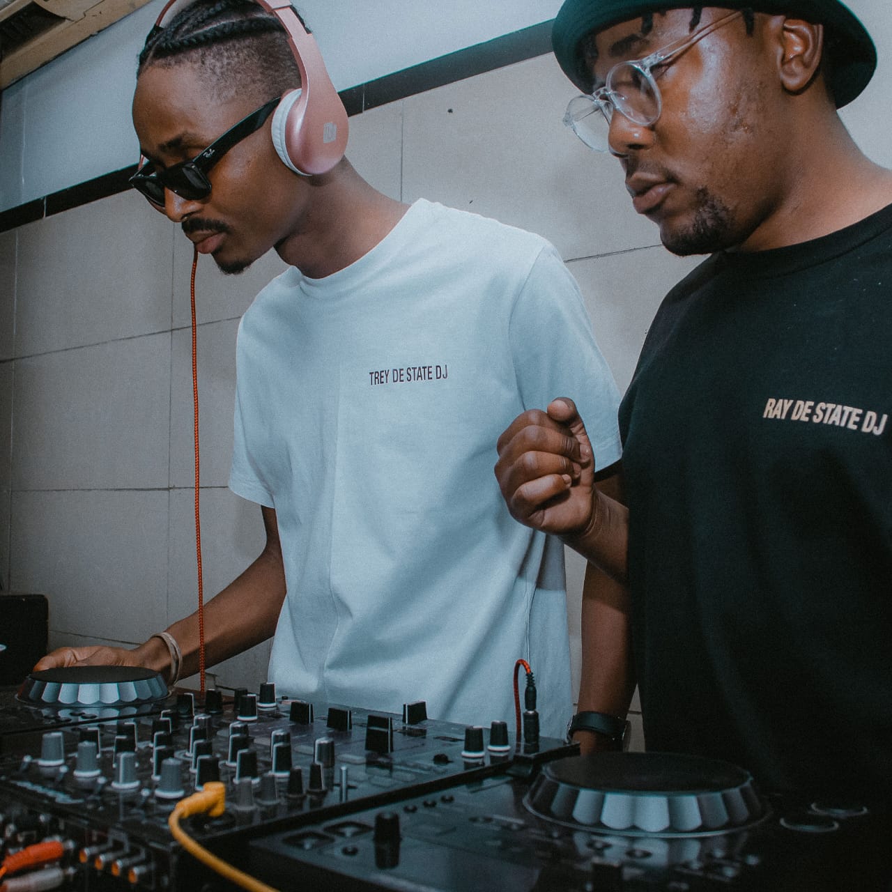 Trey and Ray DE STATE DJs at the mixer